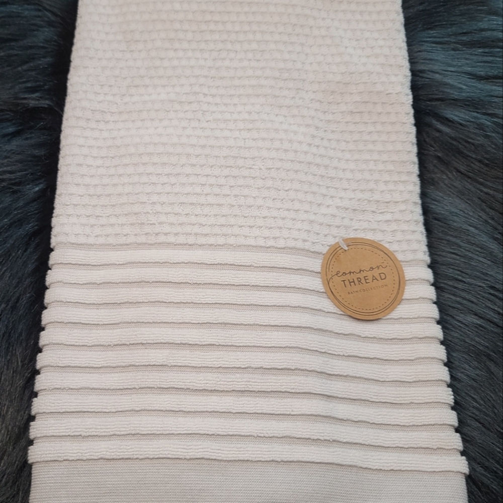 Grey and white bath towels